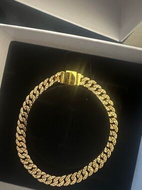 This 14k gold-plated bracelet brand New features sparkling links in a chain.